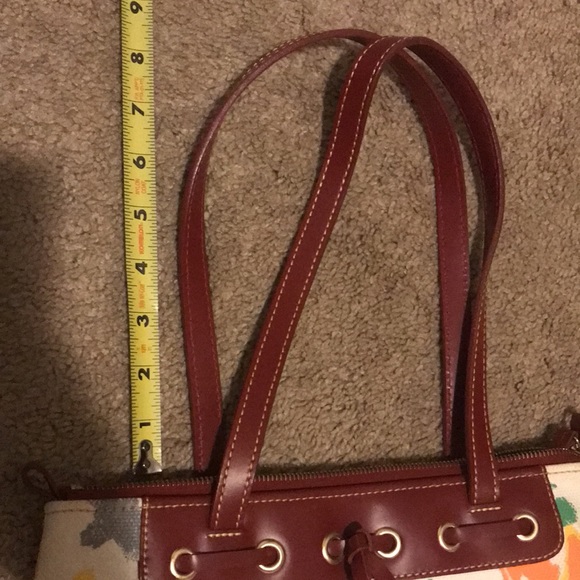 Dooney & Bourke tassel top zip purse. White main color with multicolor graffiti! - Picture 14 of 14